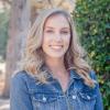 Blonde white woman in jean jacket