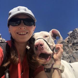 A photo of myself and my Great Dane dog.