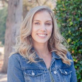 Blonde white woman in jean jacket